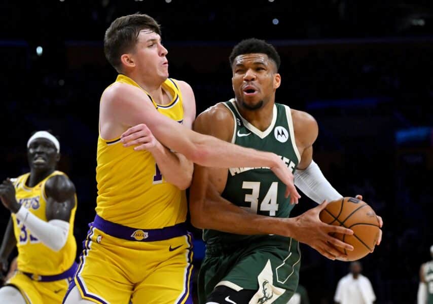 NBA Legend urges Lakers to trade rising star for Giannis Antetokounmpo 1 Feb 9, 2023; Los Angeles, California, USA; Los Angeles Lakers guard Austin Reaves (15) defends Milwaukee Bucks forward Giannis Antetokounmpo (34) as he drives to the basket in the first half at Crypto.com Arena. Mandatory Credit: Jayne Kamin-Oncea-Imagn Images