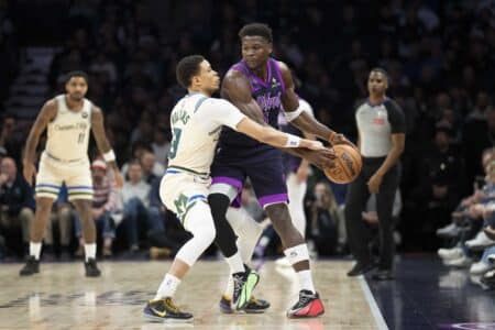 Bucks’ road struggles continue in heartbreaking 103-100 loss to Timberwolves Dec 21, 2025; Minneapolis, Minnesota, USA; Minnesota Timberwolves guard Anthony Edwards (5) holds the ball away from Milwaukee Bucks guard Ryan Rollins (13) in the first half at Target Center. Mandatory Credit: Jesse Johnson-Imagn Images