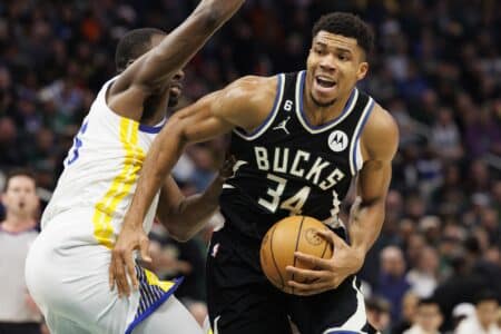 “Y’all better figure it out”: 4x NBA Champion on the stakes of Giannis Antetokounmpo trade Dec 13, 2022; Milwaukee, Wisconsin, USA; Milwaukee Bucks forward Giannis Antetokounmpo (34) drives for the basket around Golden State Warriors forward Draymond Green (23) during the third quarter at Fiserv Forum. Mandatory Credit: Jeff Hanisch-Imagn Images
