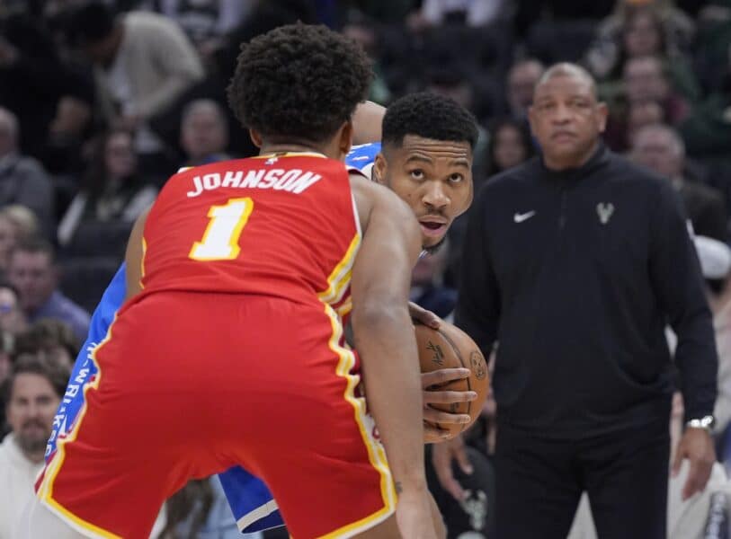 Bucks survive Hawks surge 112-110, after 23 point collapse 1 Dec 4, 2024; Milwaukee, Wisconsin, USA; Milwaukee Bucks forward Giannis Antetokounmpo (34) and Atlanta Hawks forward Jalen Johnson (1) square off in the first half at Fiserv Forum. Mandatory Credit: Michael McLoone-Imagn Images