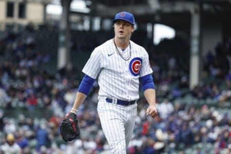 Chicago Cubs starting pitcher Justin Steele (35) returns to dugout after delivering against the Milwaukee Brewers during the first inning at Wrigley Field.