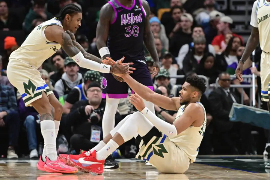 Doc Rivers' midseason indifference is anything but what Bucks fans want to hear 1 Jan 13, 2026; Milwaukee, Wisconsin, USA; Milwaukee Bucks forward Giannis Antetokounmpo (34) is helped up by guard Kevin Porter (7) after a foul in the third quarter against the Minnesota Timberwolves at Fiserv Forum. Mandatory Credit: Benny Sieu-Imagn Images