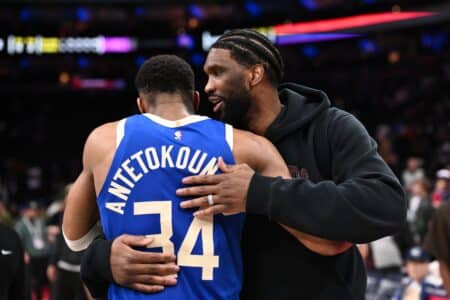 Apr 3, 2025; Philadelphia, Pennsylvania, USA; Philadelphia 76ers center Joel Embiid reacts with Milwaukee Bucks forward Giannis Antetokounmpo (34) after the game at Wells Fargo Center. Mandatory Credit: Kyle Ross-Imagn Images