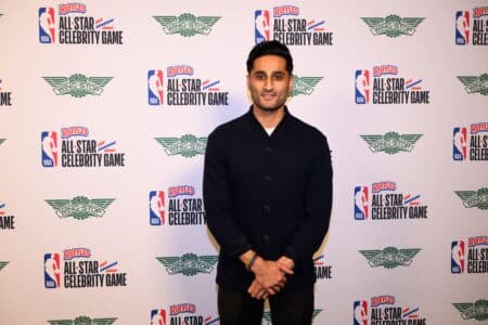 Giannis Antetokounmpo has fun poking at Shams Charania during NBA Celebrity Game Feb 13, 2026; Los Angeles, CA, USA; Shams Charania arrives on the green carpet prior to an NBA Celebrity All-Star basketball game at Kia Forum. Mandatory Credit: William Liang-Imagn Images