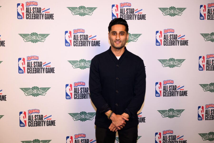 Giannis Antetokounmpo has fun poking at Shams Charania during NBA Celebrity Game Feb 13, 2026; Los Angeles, CA, USA; Shams Charania arrives on the green carpet prior to an NBA Celebrity All-Star basketball game at Kia Forum. Mandatory Credit: William Liang-Imagn Images