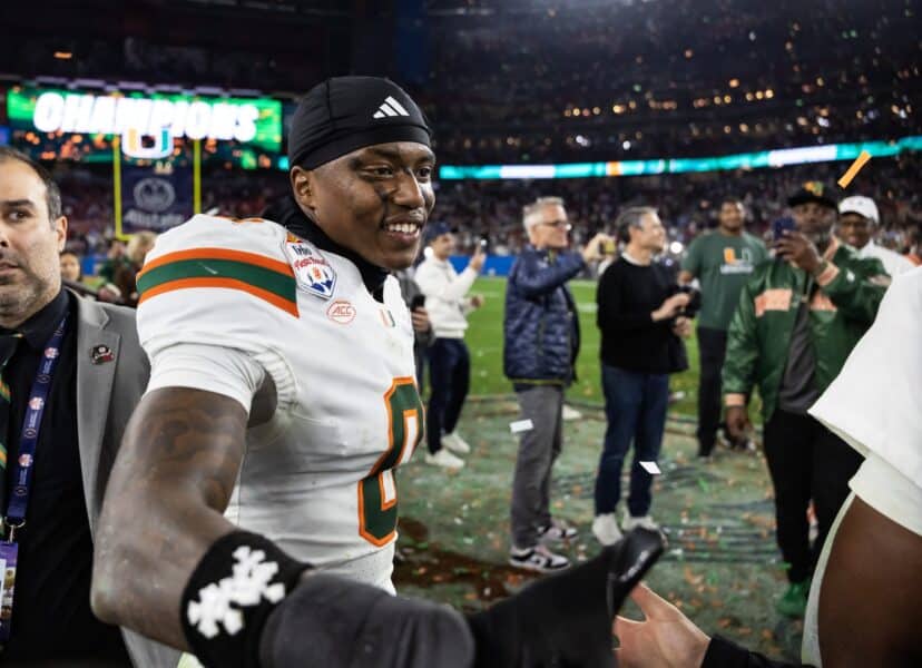 Jan 8, 2026; Glendale, AZ, USA; Miami Hurricanes defensive back Keionte Scott (0) celebrates after defeating the Mississippi Rebels during the 2026 Fiesta Bowl and semifinal game of the College Football Playoff at State Farm Stadium. Mandatory Credit: Mark J. Rebilas-Imagn Images